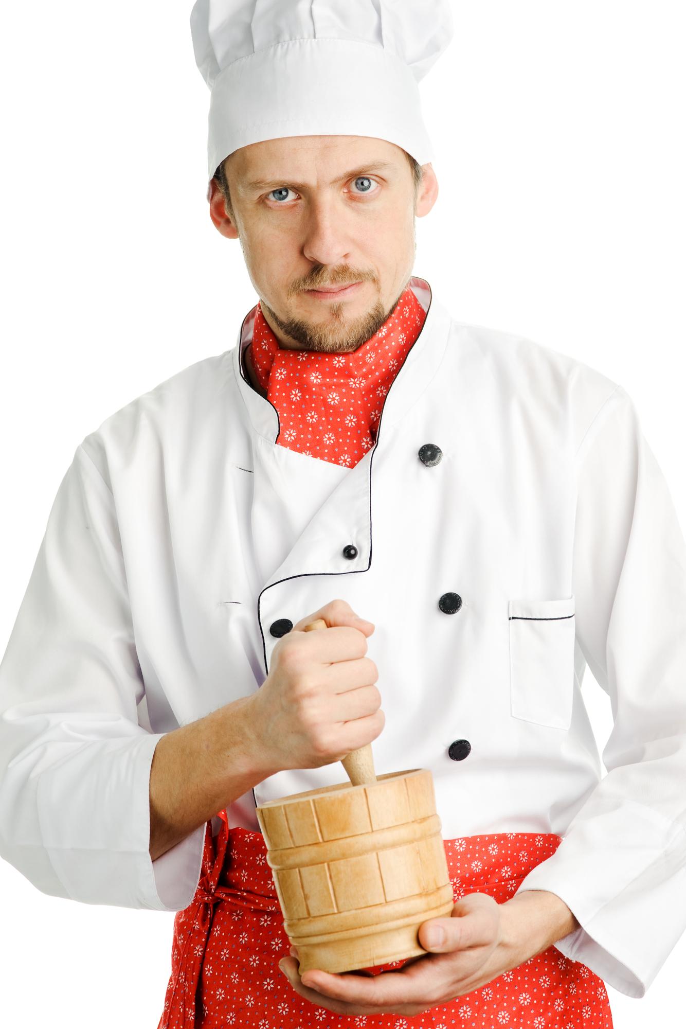Chef demonstrating technique to a small group